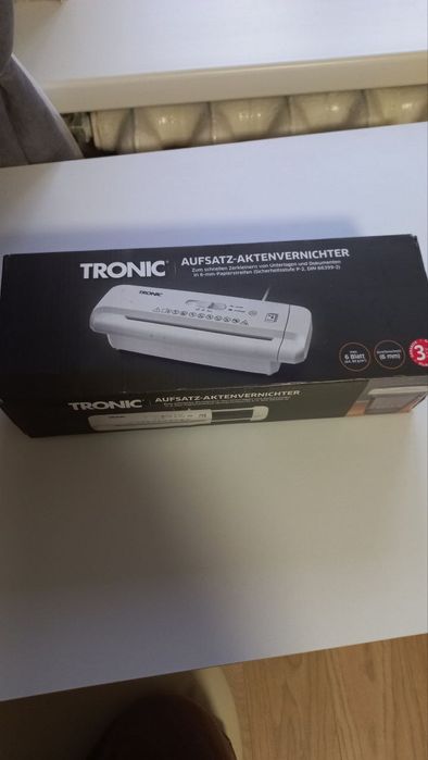 Шредер, подрібнювач паперу Tronic Aufsatz-Aktenvernichter.