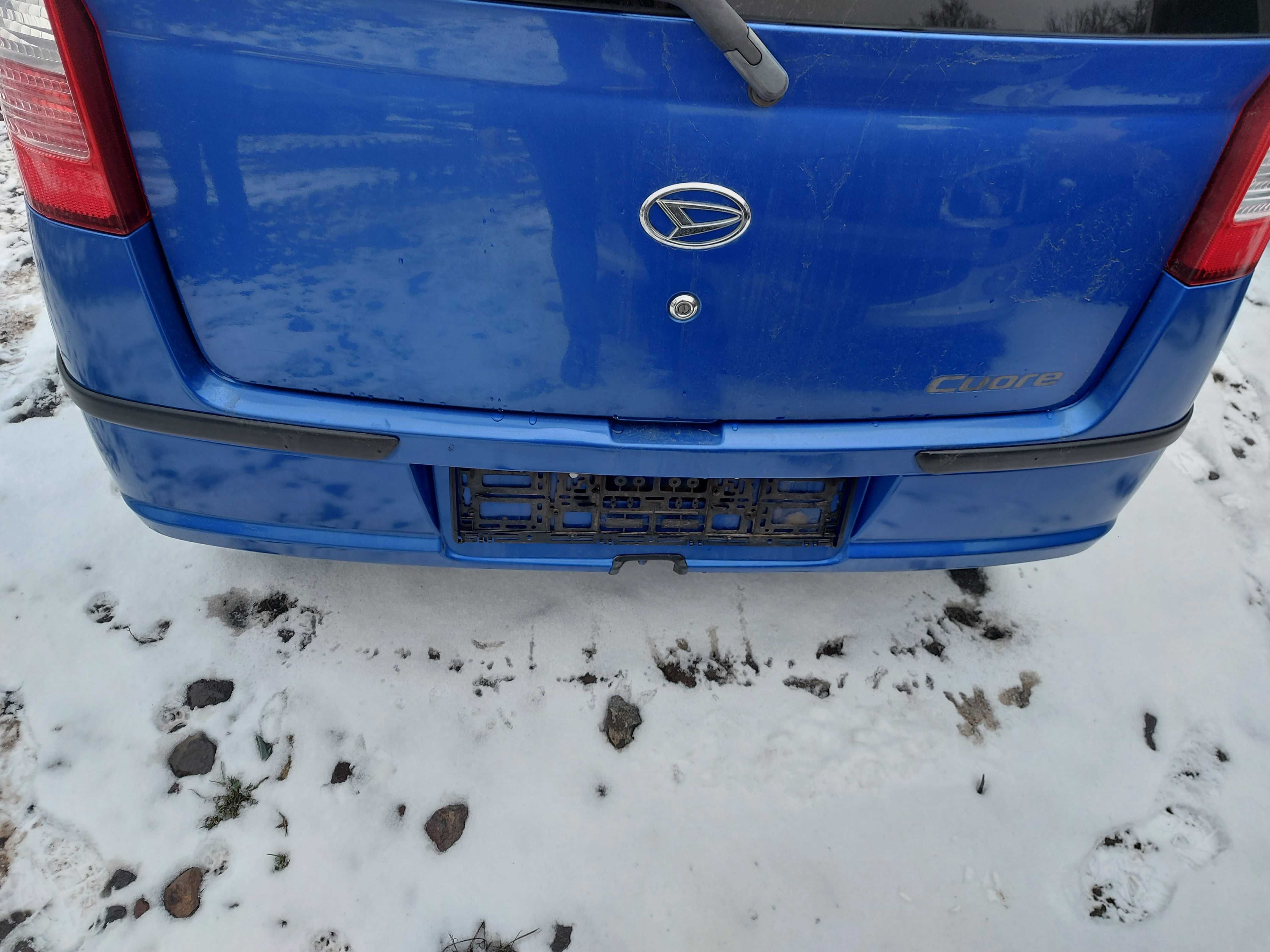 Daihatsu Cuore VI zderzak tylny FV transport/dostawa