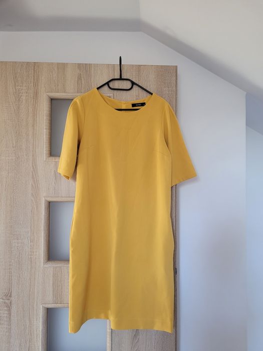Musztardowa sukienka rozmiar M