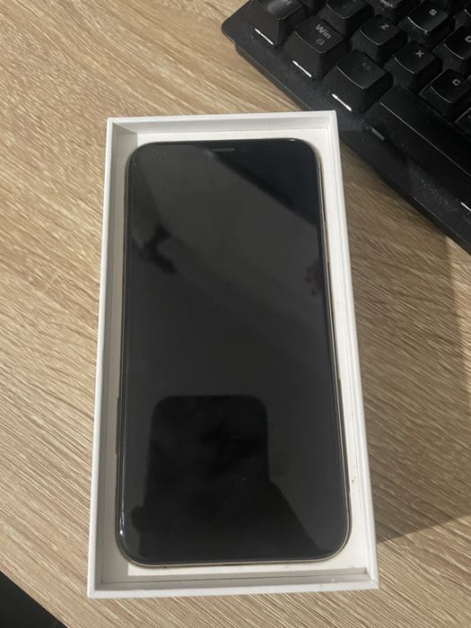 Iphone xs dourado com 64gb 77% bateria