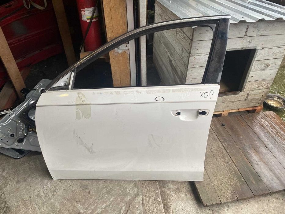 Двер передня левая volkswagen Pas B7 USA 13-19;(колір може бути інший)