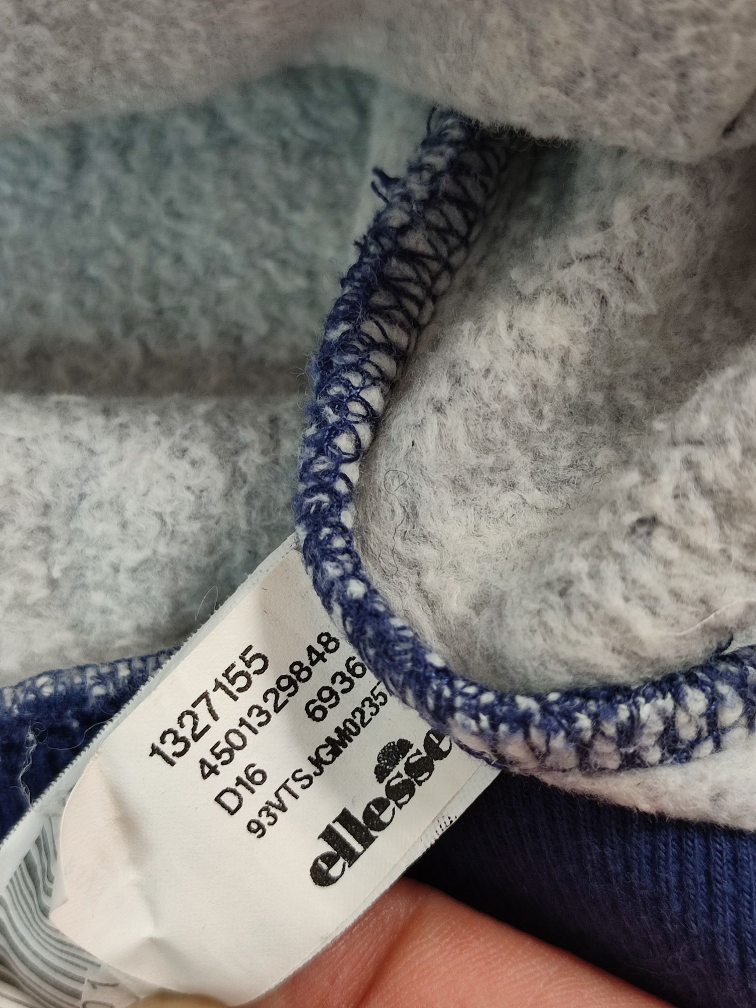 Granatowa bluza ellesse L  z kieszenią kangurką i naszywkami na łokci