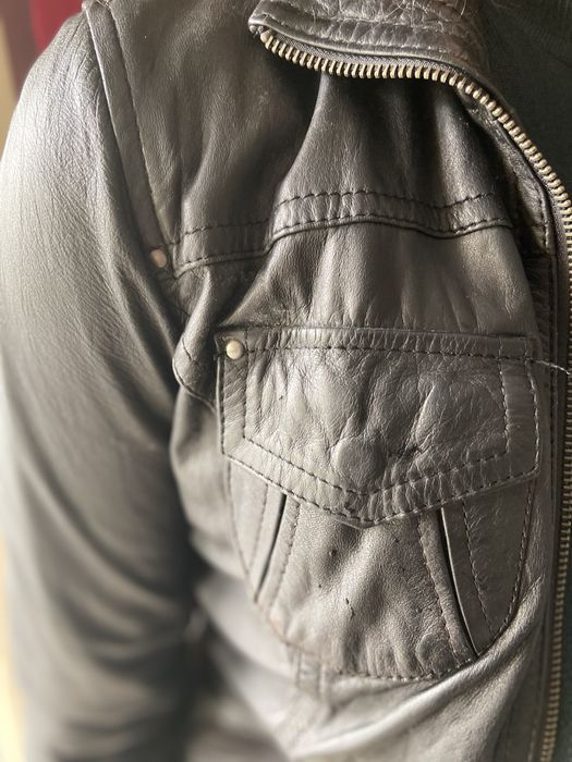 Blusão preto de pele