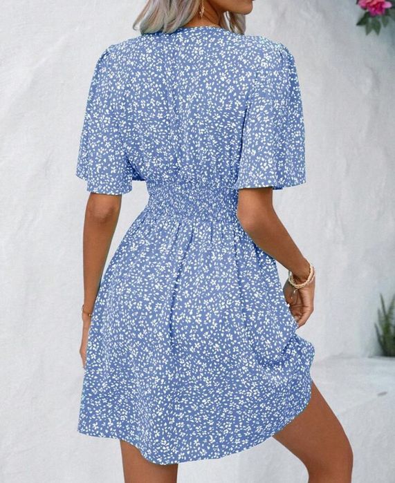 Używana NIEBIESKA BŁĘKITNA SUKIENKA przed kolano rękaw motylek R. S