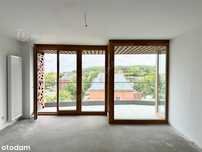 Apartament 55,28m2, miejsce postojowe w hali.