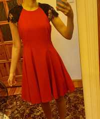 Sprzedam piękna, czerwoną sukienkę.