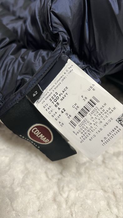 Пухова куртка відомого бренду Colmar.42р