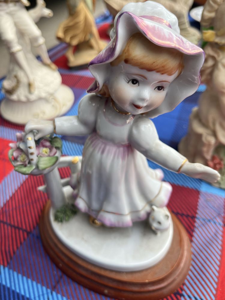 Bonecos porcelana antigos