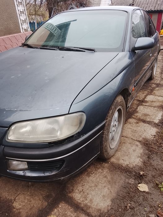 Опель Омега б 2.0