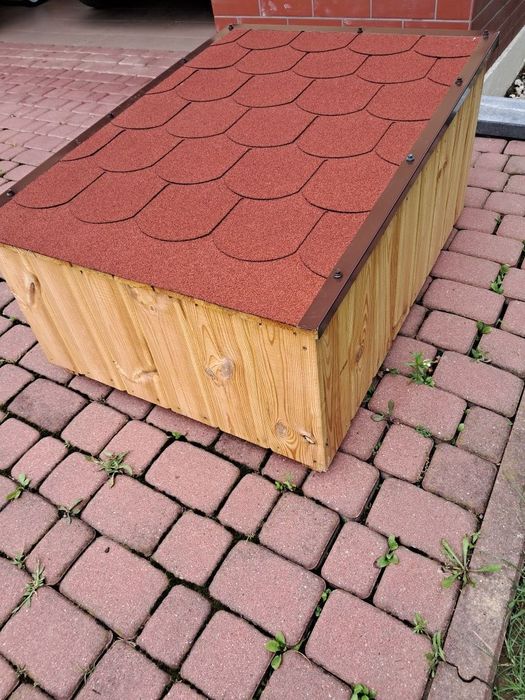 Garaż na  robot koszący