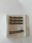 Technics emblemat. 3cm długi, 0,5 cm w najwy miejscu czyli literka "T"