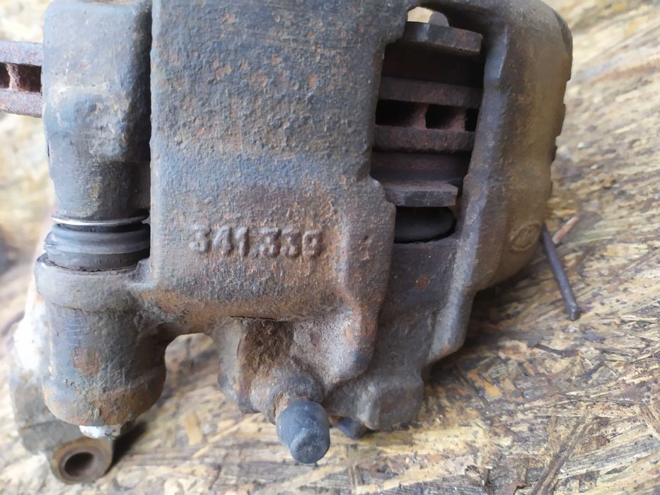 Супорт передній правий  Форд Ескорт 1.8 Ford Escort Mk7