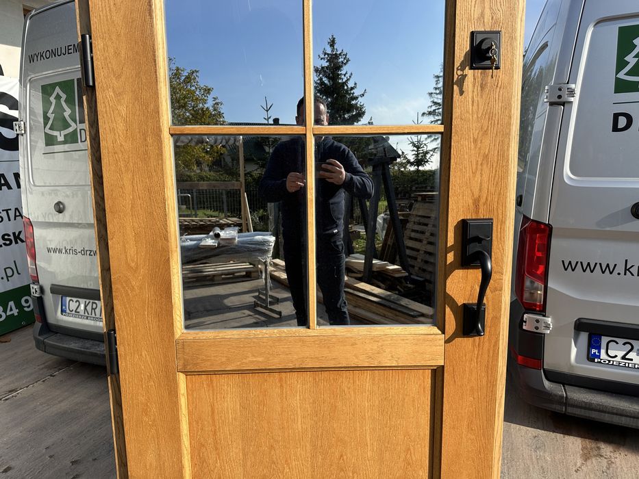 Drzwi zewnętrzne drewniane z klamką Schlage na wymiar Czyste powietrze