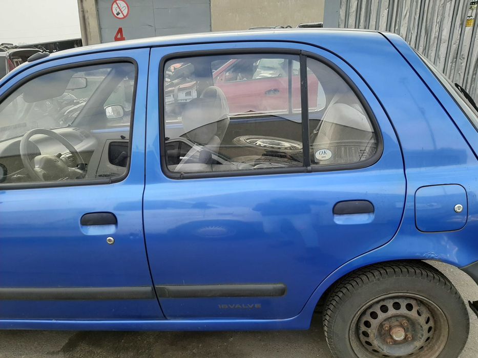 Nissan Micra K11 5D 1.0i 1995r.Drzwi przednie lewe.