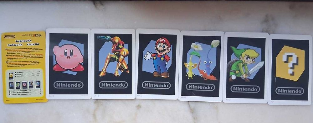 Nintendo 2DS Pokémon Sun/Moon Azul + 8 Jogos + Carregador + Estojo