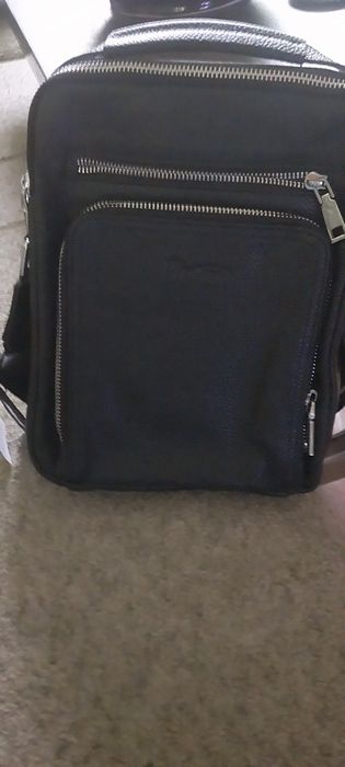 Продам новую мужскую сумку.