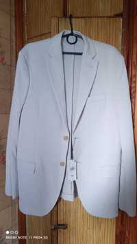 Продам  мужской пиджак фирмы (MANGO) кремового цвета