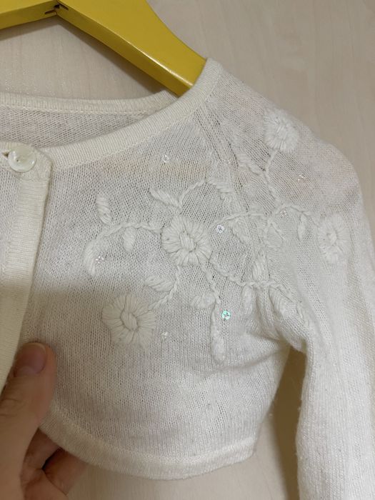 Біле болеро для дівчинки