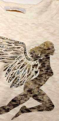 Bluza Reserved - kobieta ze skrzydłami.