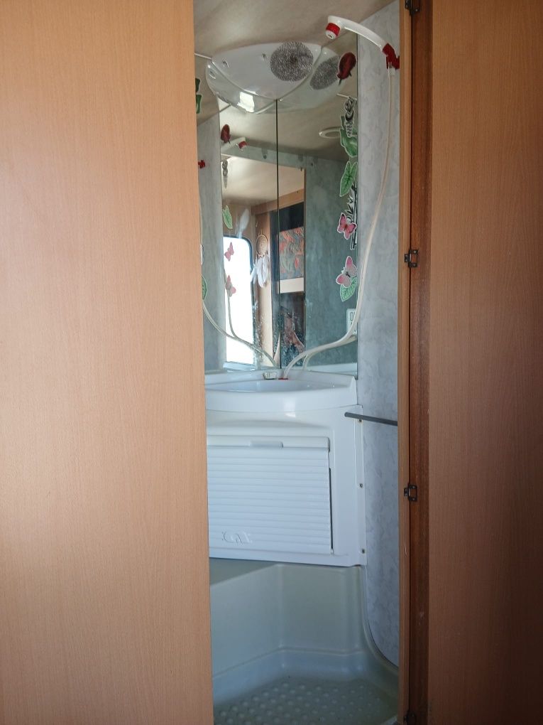 Caravana Painel solar e duche