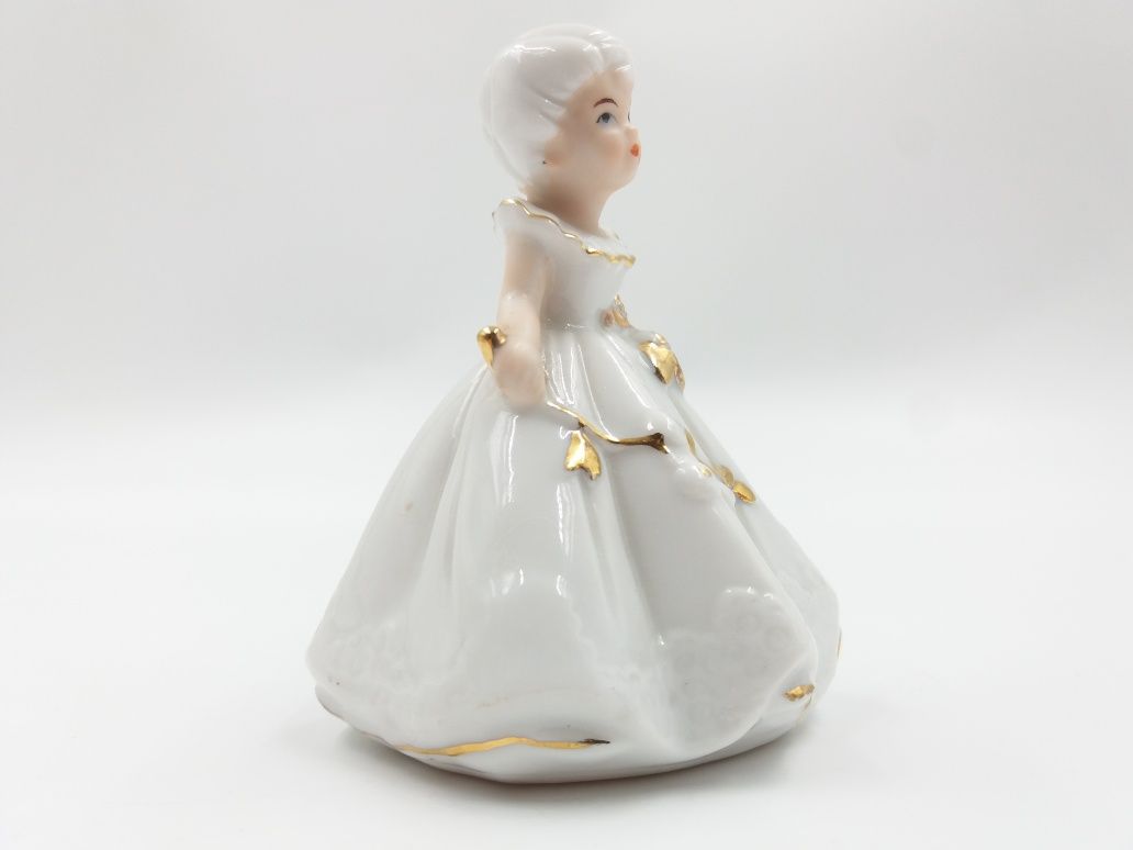 Delikatna śliczna porcelanowa figurka dziewczynki małej księżniczki