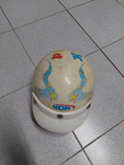 Dou capacete de mota para criança