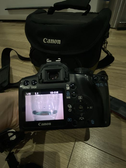 Aparat fotograficzny lustrzanka canon 1000D z pokrowcem torba
