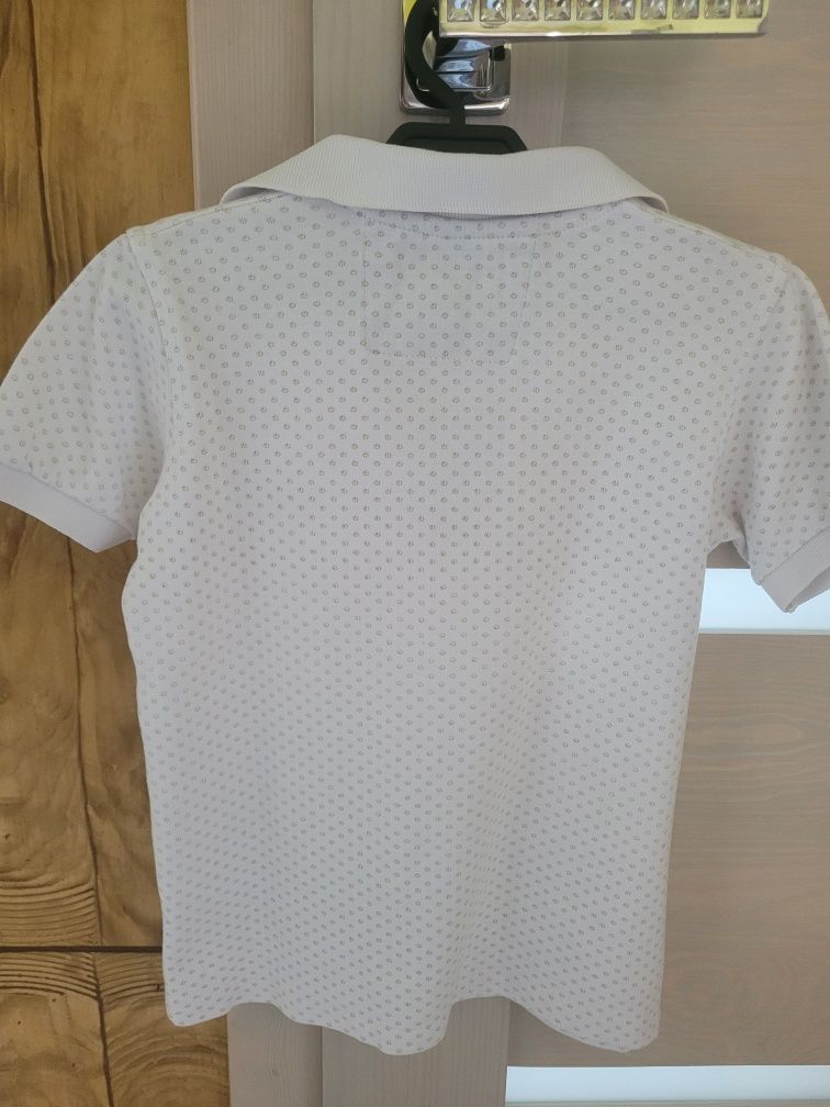 Biała koszulka polo 116 cm.