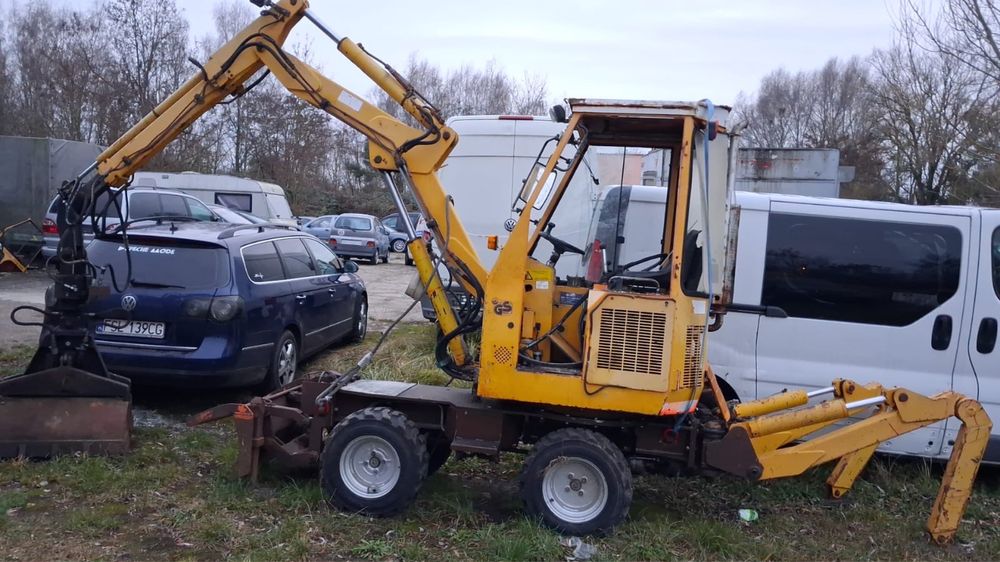 Копарка копати ями на цвинтарі могили міні маніту міні екскаватор