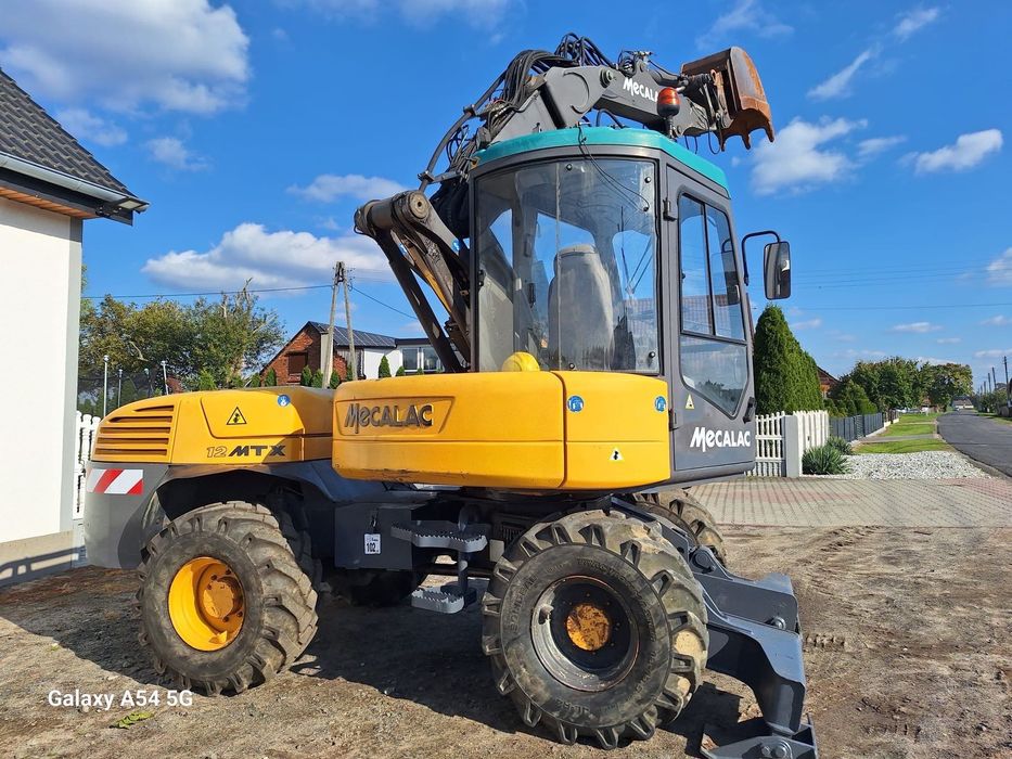 Mecalac 12MTX  Koparko ładowarka Mecalac 12MTX oryginał bruto