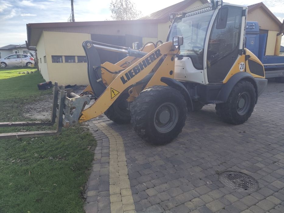 Ładowarka liebherr 508 cat jcb