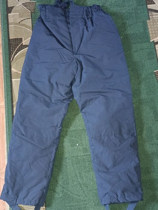 Продам зимние штаны новые