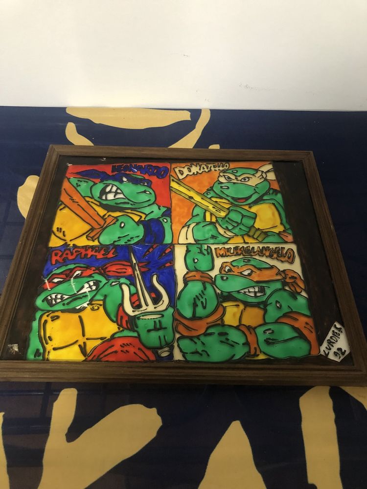 Tatarugas ninja pintado sobre o vidro