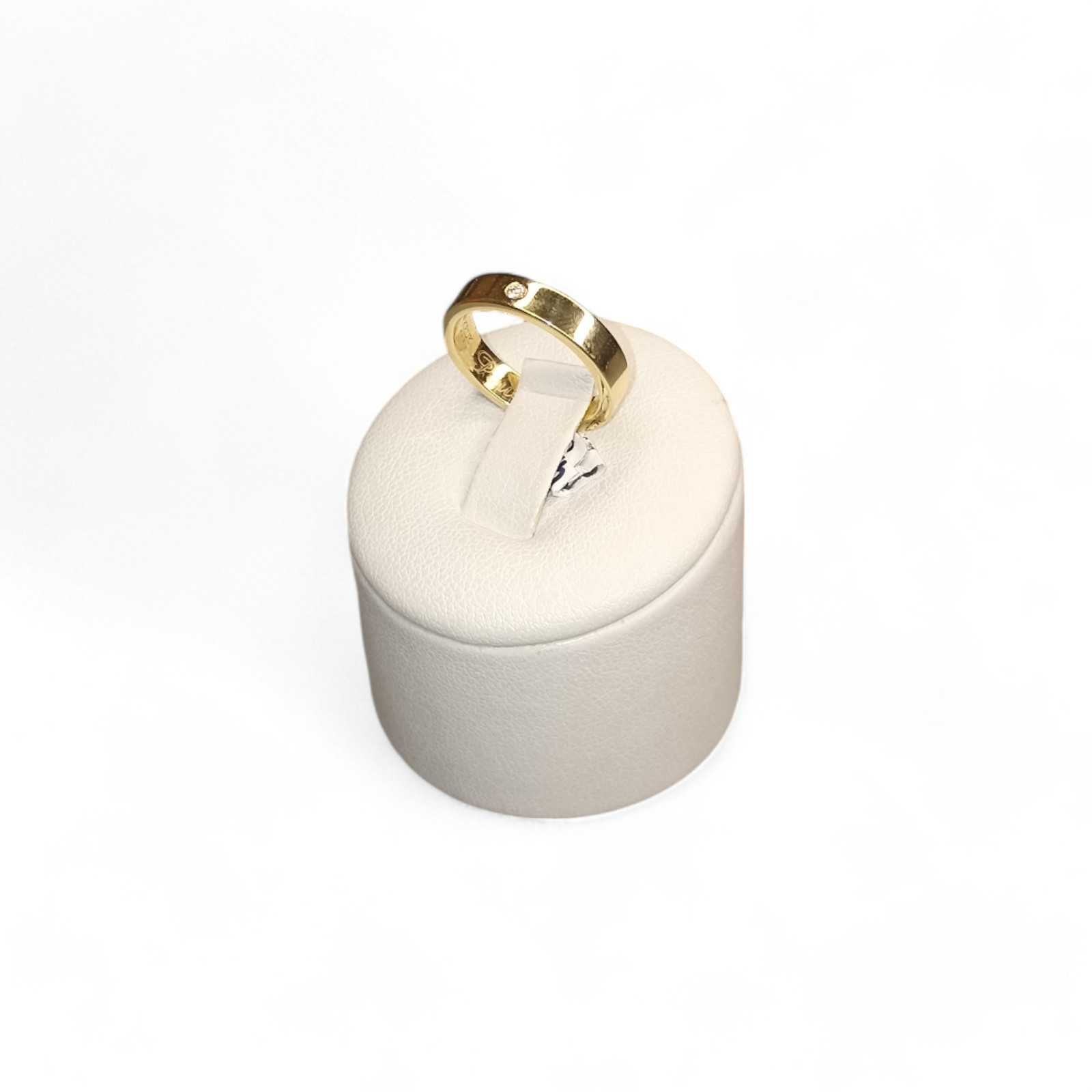 Złota obrączka z diamentem, 0,03ct. pr. 585, 4,27g. roz. 12