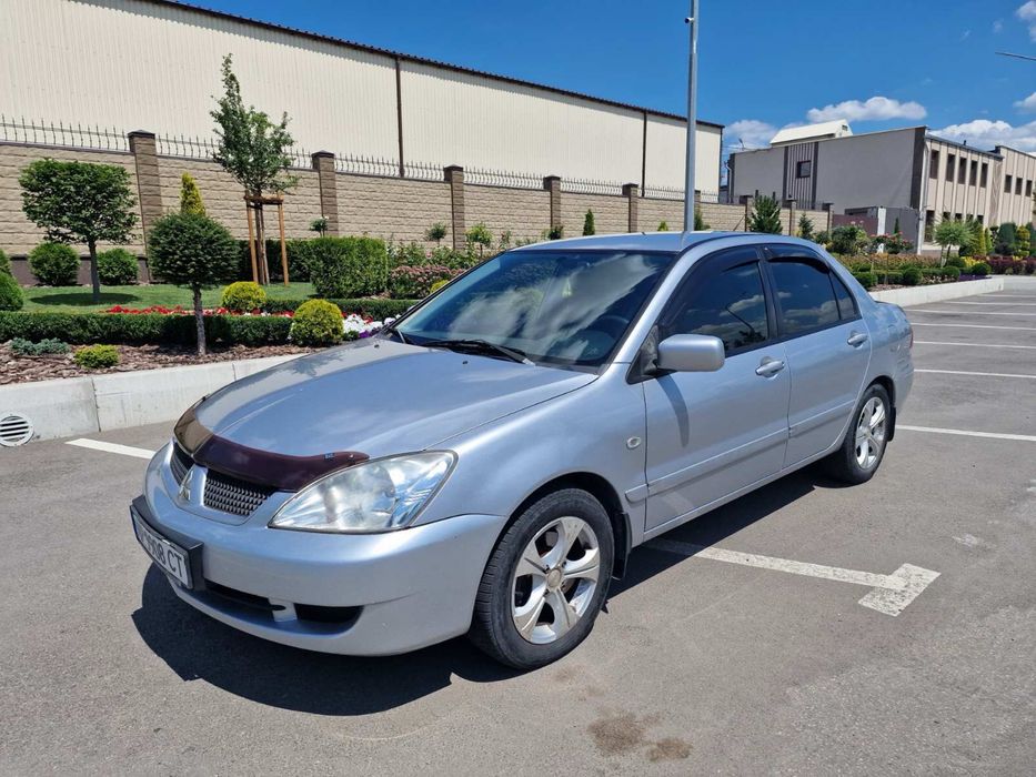 Mitsubishi Lancer 9 бензин 1.6