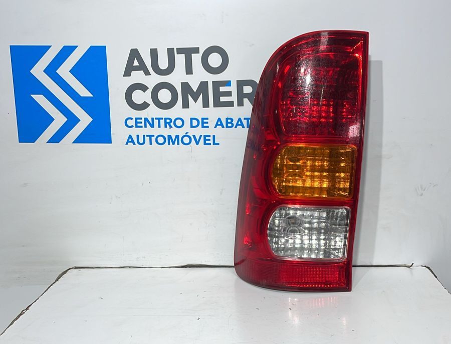 FAROLIM TRASEIRO ESQUERDO TOYOTA HILUX VI [97-06]