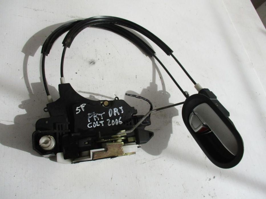 Fechadura porta Mitsubishi Colt 2004 a 2009 frente direito