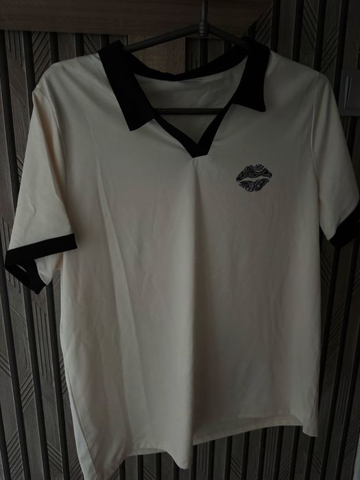 Футболка по бірці Л, але можна і на М