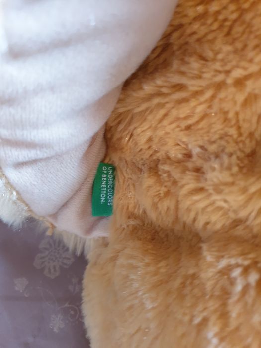 Descansa pés em pêlo Benetton