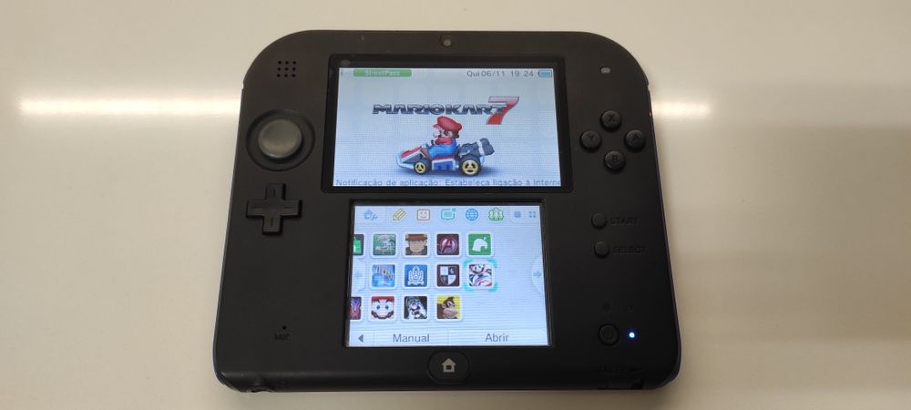 Vendo Nintendo 2DS com muitos jogos digitais.