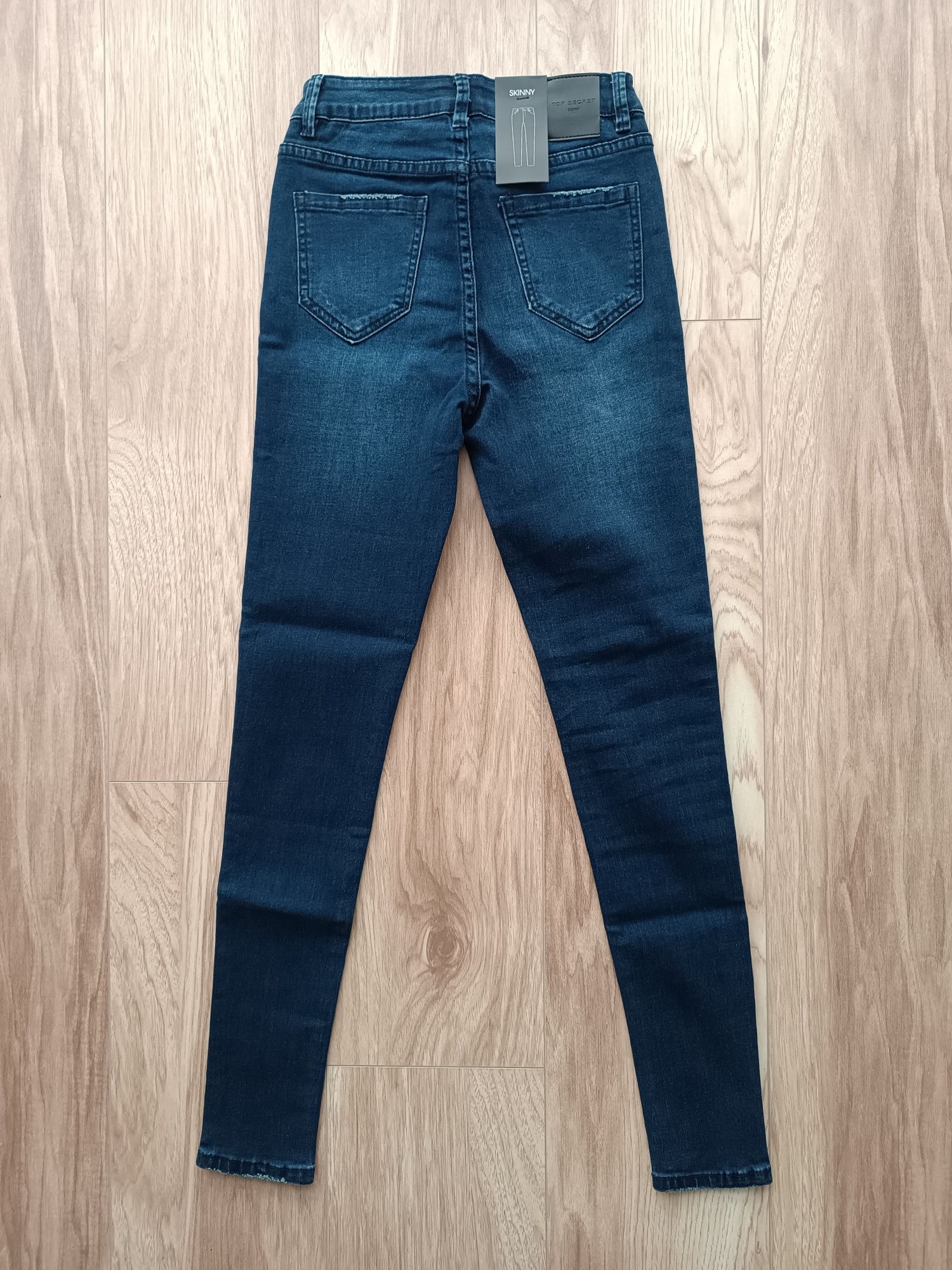 Granatowe jeansy rurki z błyszczącymi kamykami skinny 34 xs