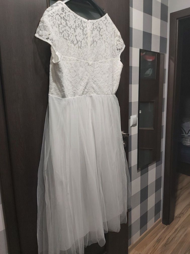 Suknia ślubna plus size