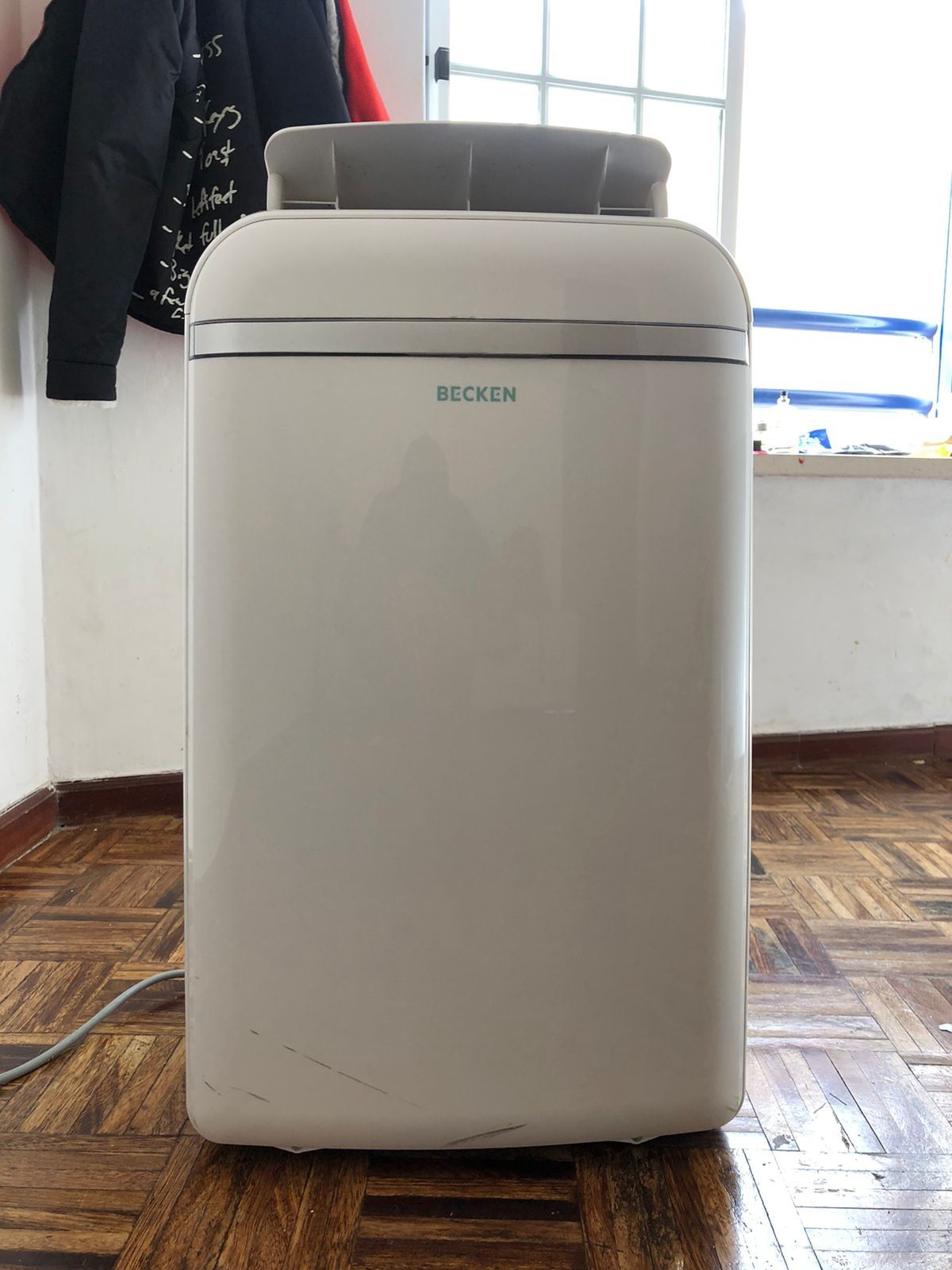 Ar condicionado e aquecedor (dupla funçâo)