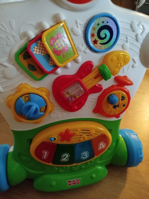 Smiki muzyczny chodzik zabawka edukacyjna pchacz jezdzik