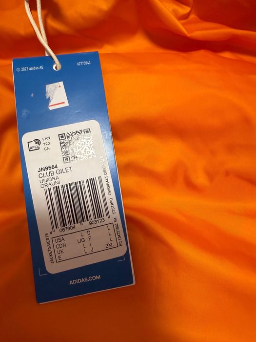 Зимова тепла жилетка adidas оригінал нова з біркою ,розмір Л . Унісекс