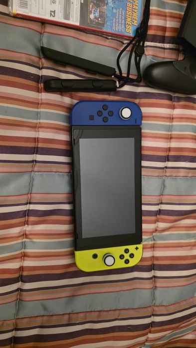 Nintendo switch com acessórios e jogo