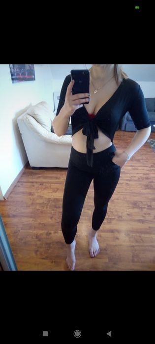 Kombinezon sexi wiązany długi dekolt podkreślający spodnie crop top xs