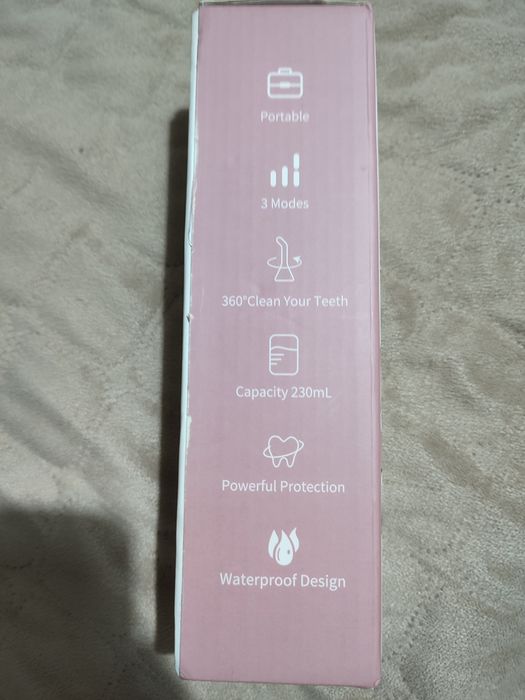 Irrigador oral elétrico portátil