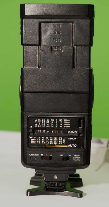 Фотовспышка Tumax-320TEZ. Ведущее число -32. ДВОЙНОЙ излучатель