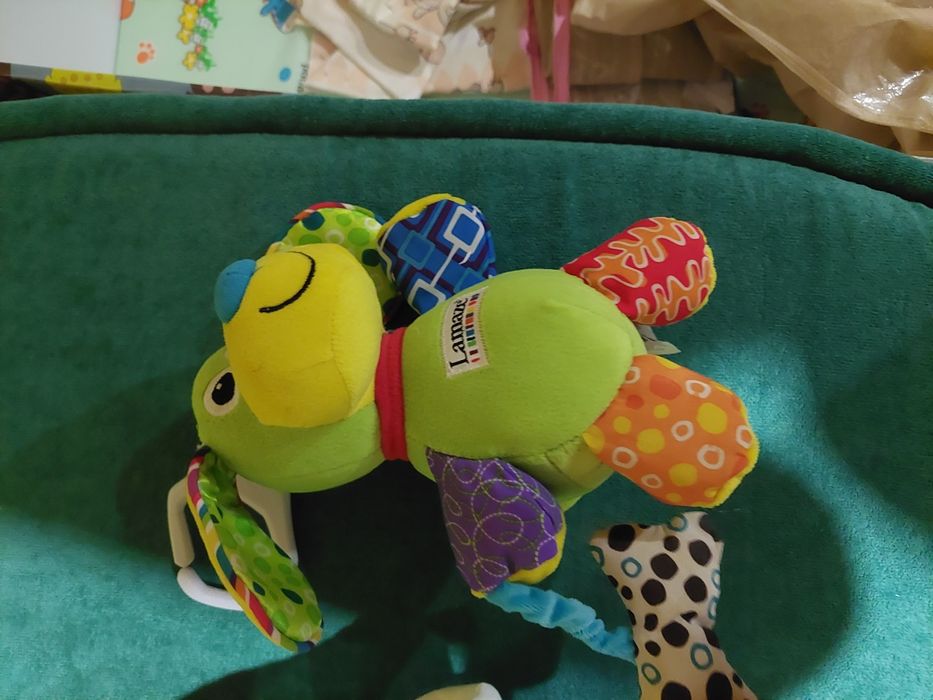 Іграшка на коляску